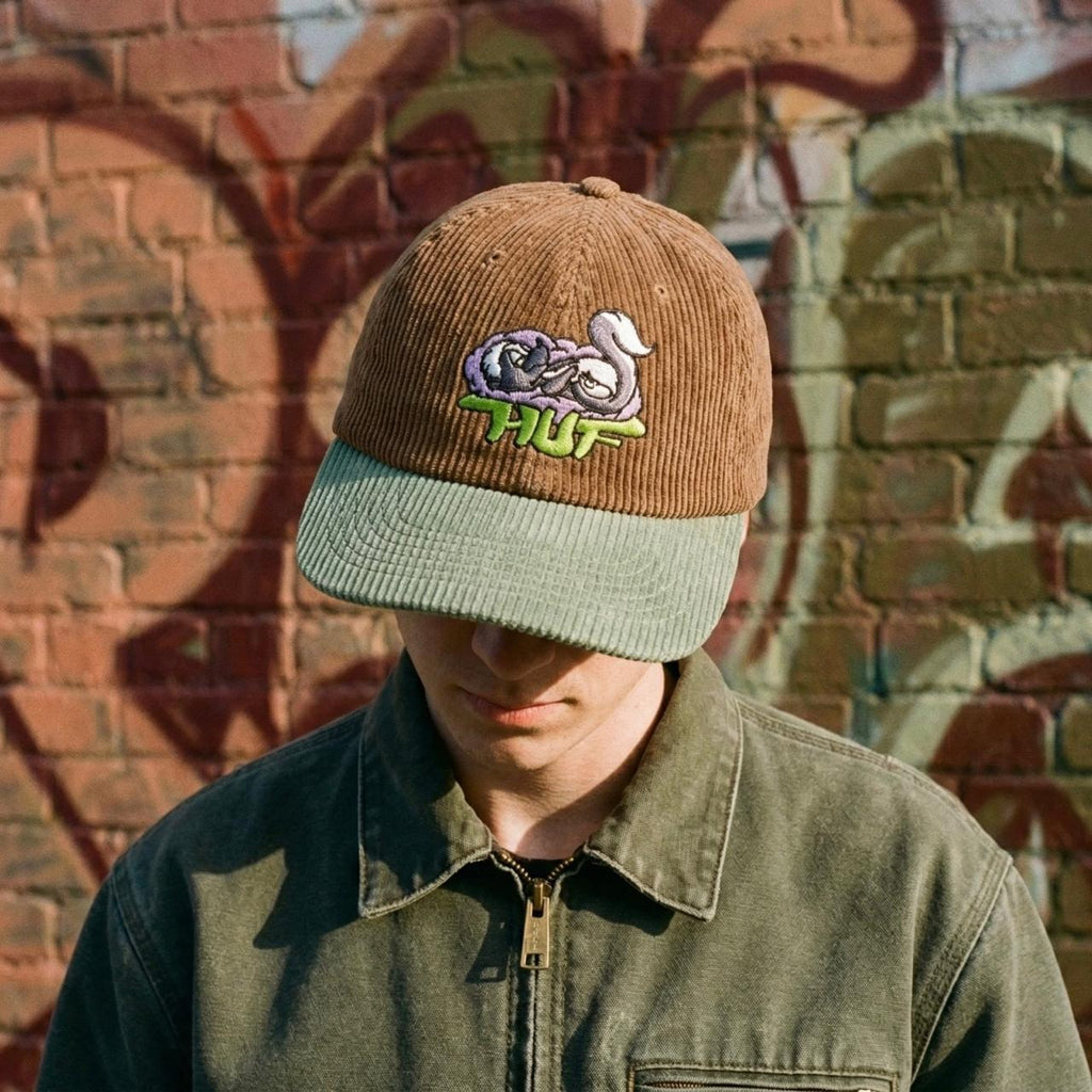 SKUNKY SNAPBACK HAT